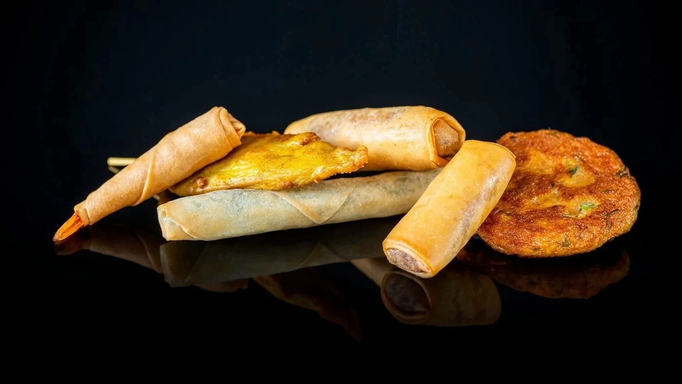 Ruam mit — mix van loempia’s, kipsaté en viskoekje